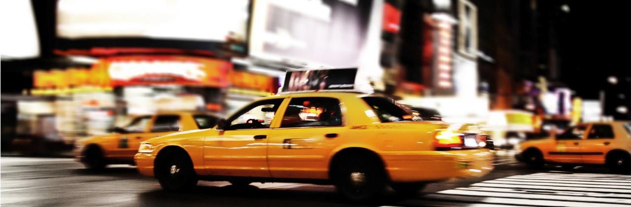 shutterstock_38308600-Yellow-cab-in-Times-Square-New-York